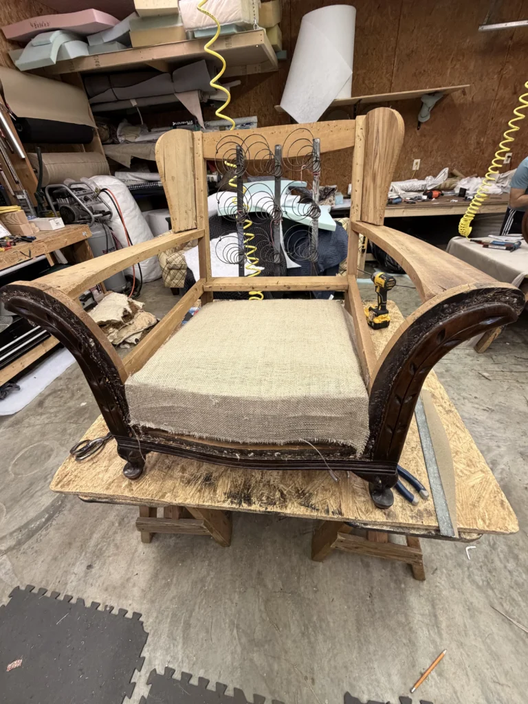 Image of a chair/seat before it was reupholstered